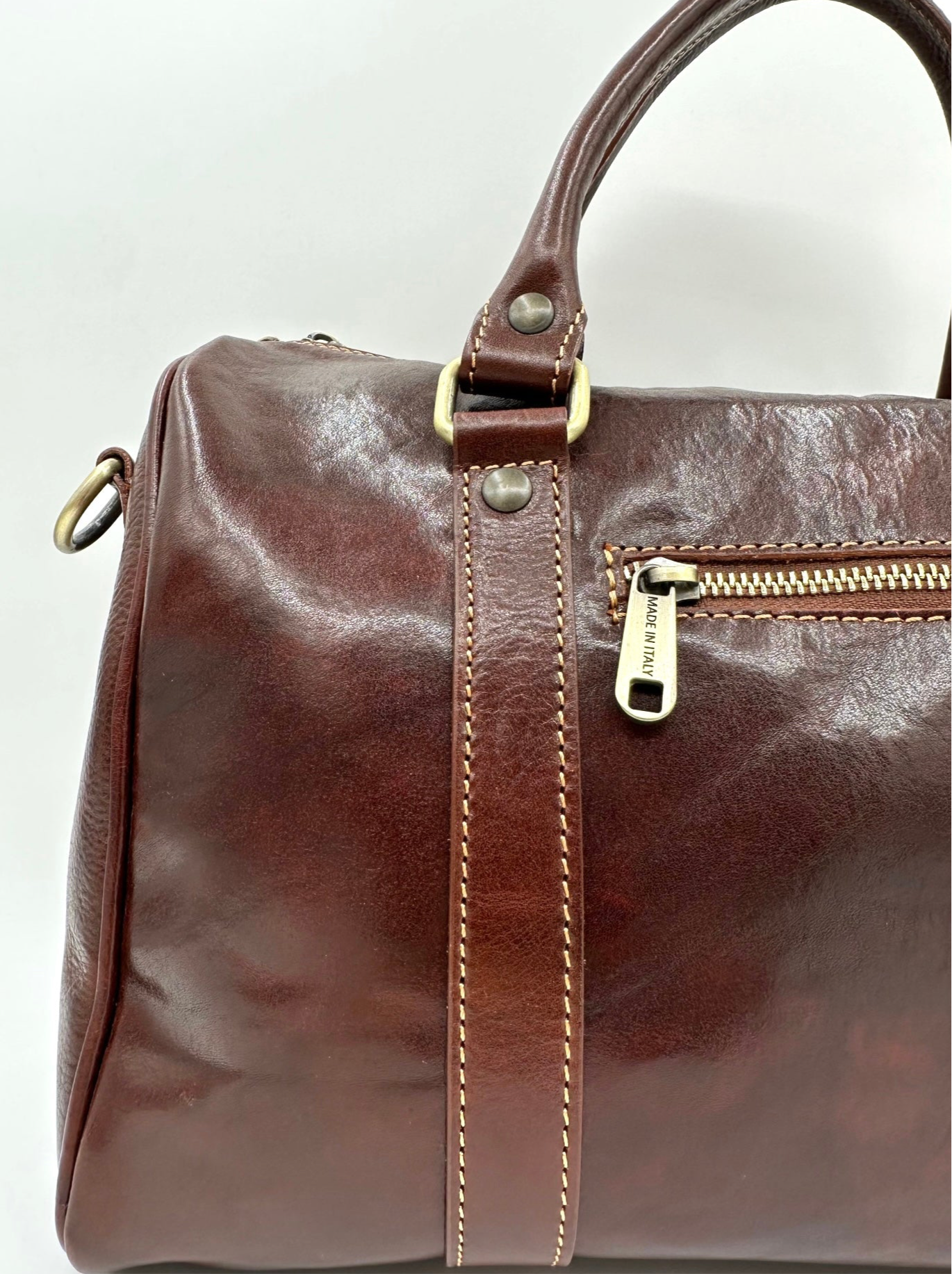 Baulotto in cuoio unisex