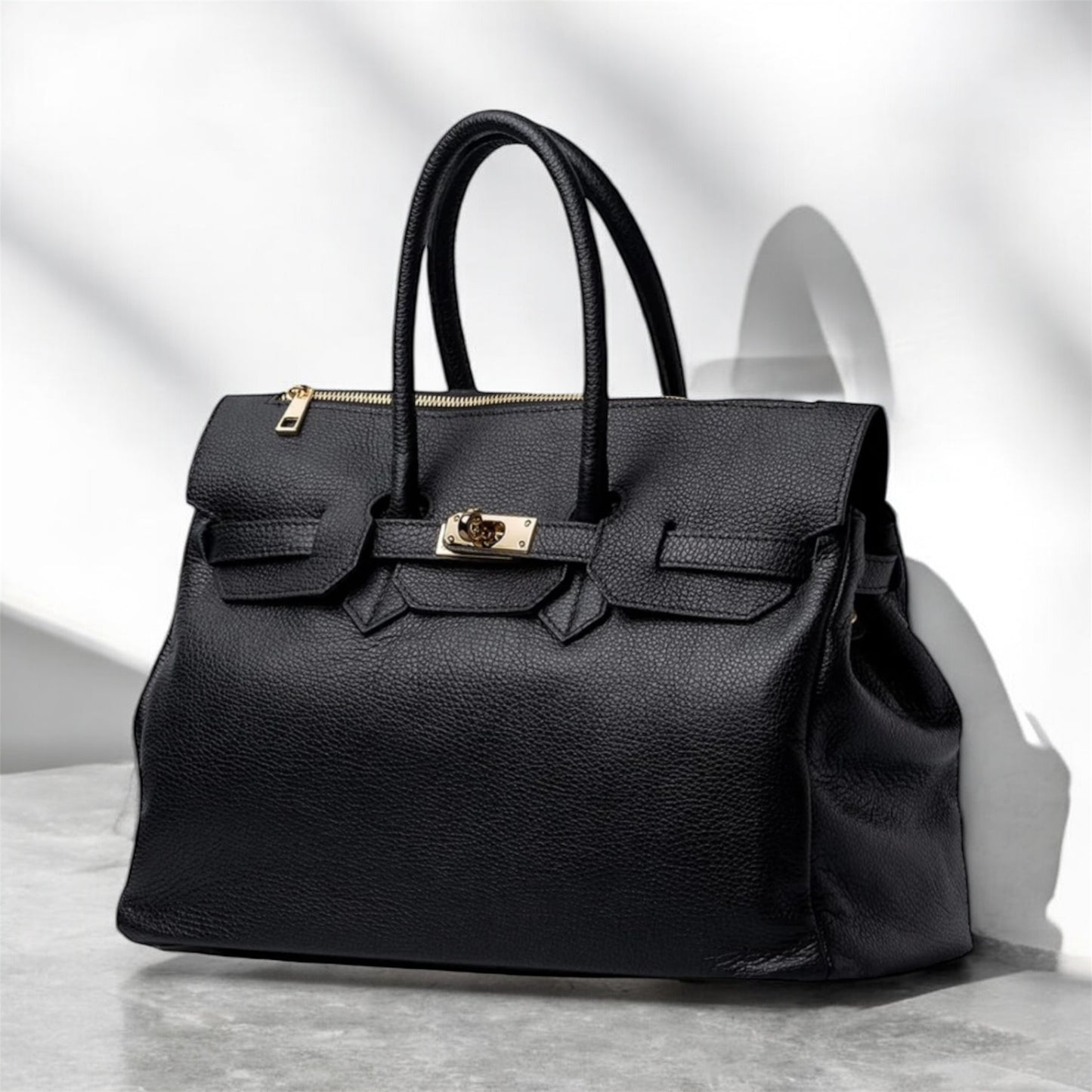 Borsa due manici in pelle martellata